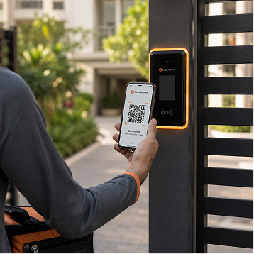 Staff member scanning a QR entry pass at a side gate